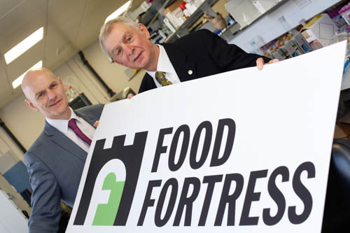 Professor Chris Elliott, Queens University with Robin Irvine, Chief Executive, NIGTA.